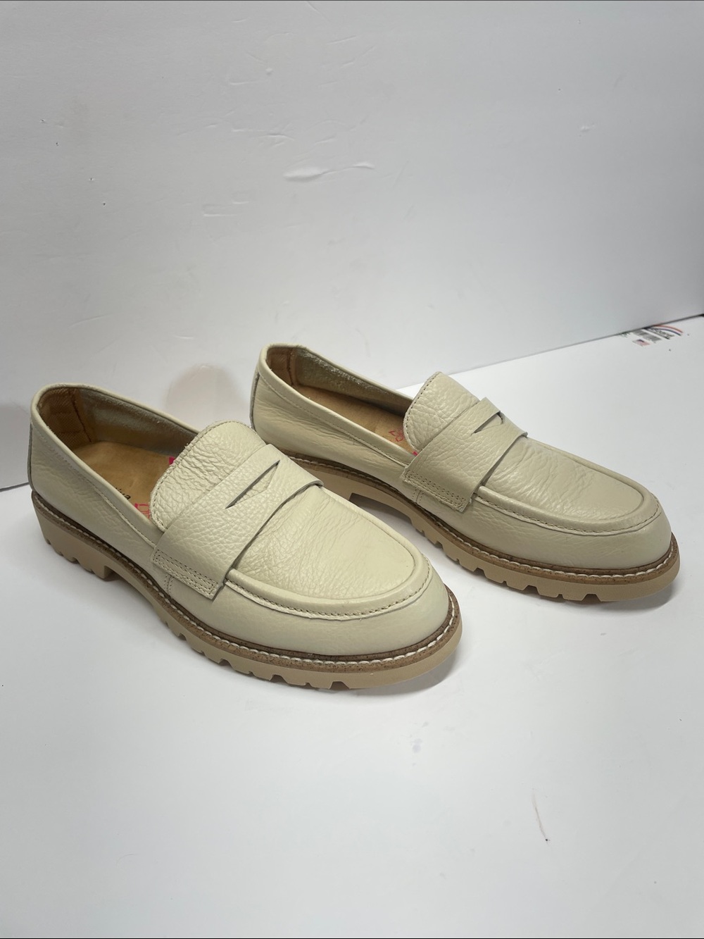 Comfortiva Cream Leather Lug Sole Penny Loafers with Tan Outsole